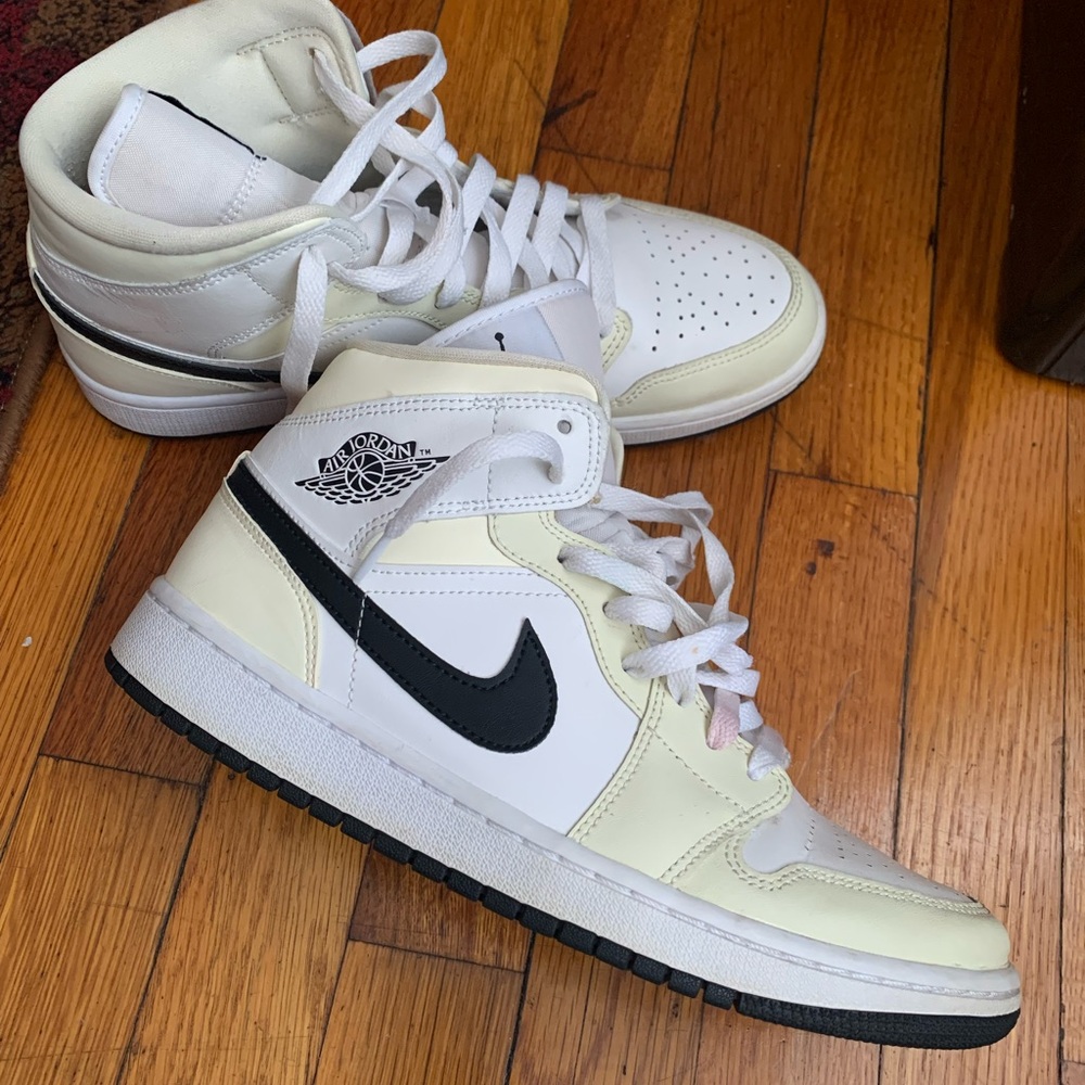 Nike High-Top Sneakers with Black Swoosh and White Base